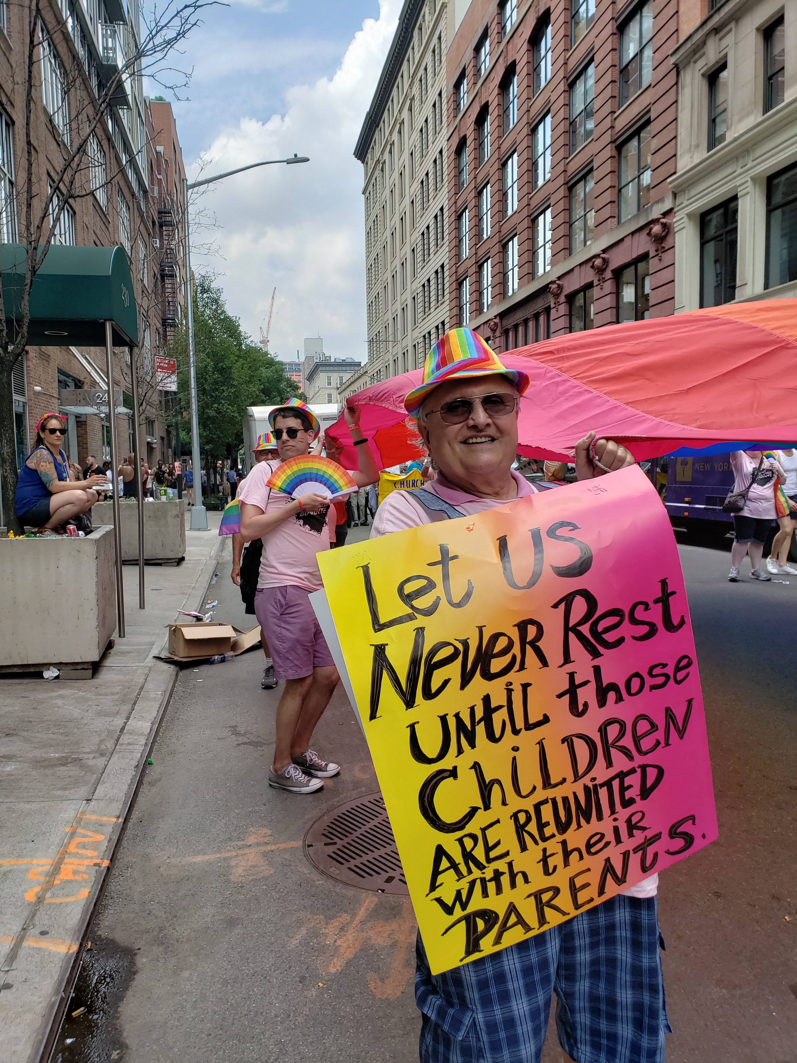 Jim and Brian holding the Pride Flag, Pride 2018